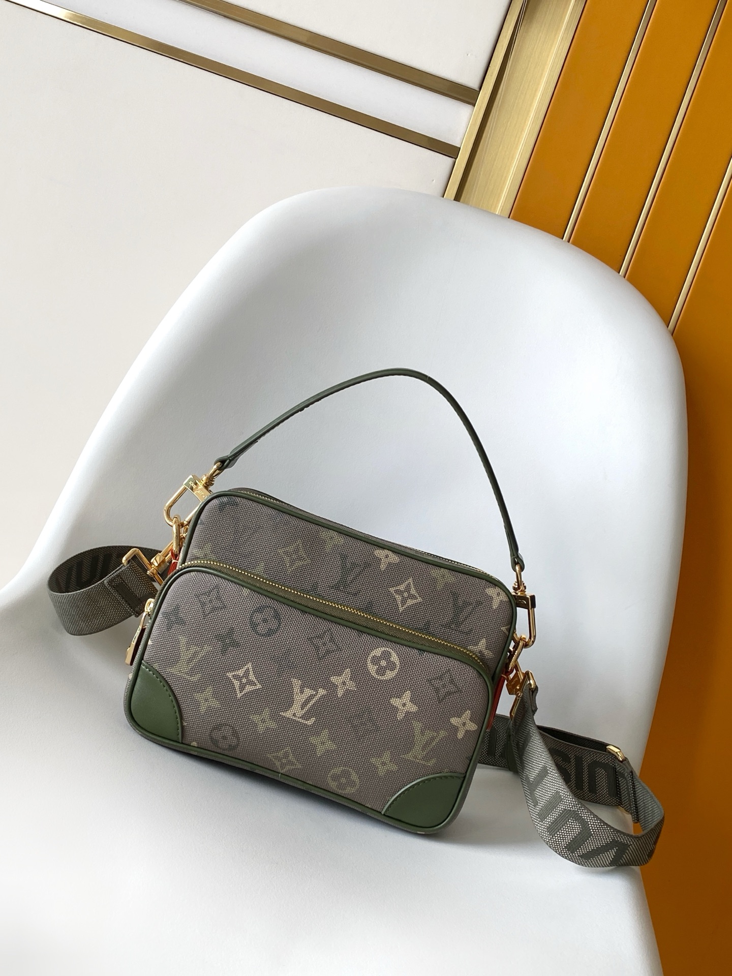 Louis Vuitton This Nil crossbody bag features a vintage silhouette crafted from Monogram Heritage canvas.