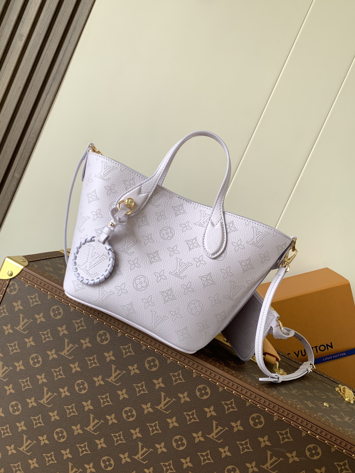 Louis Vuitton This small Blossom handbag is steeped in the modern hues of the new season.
