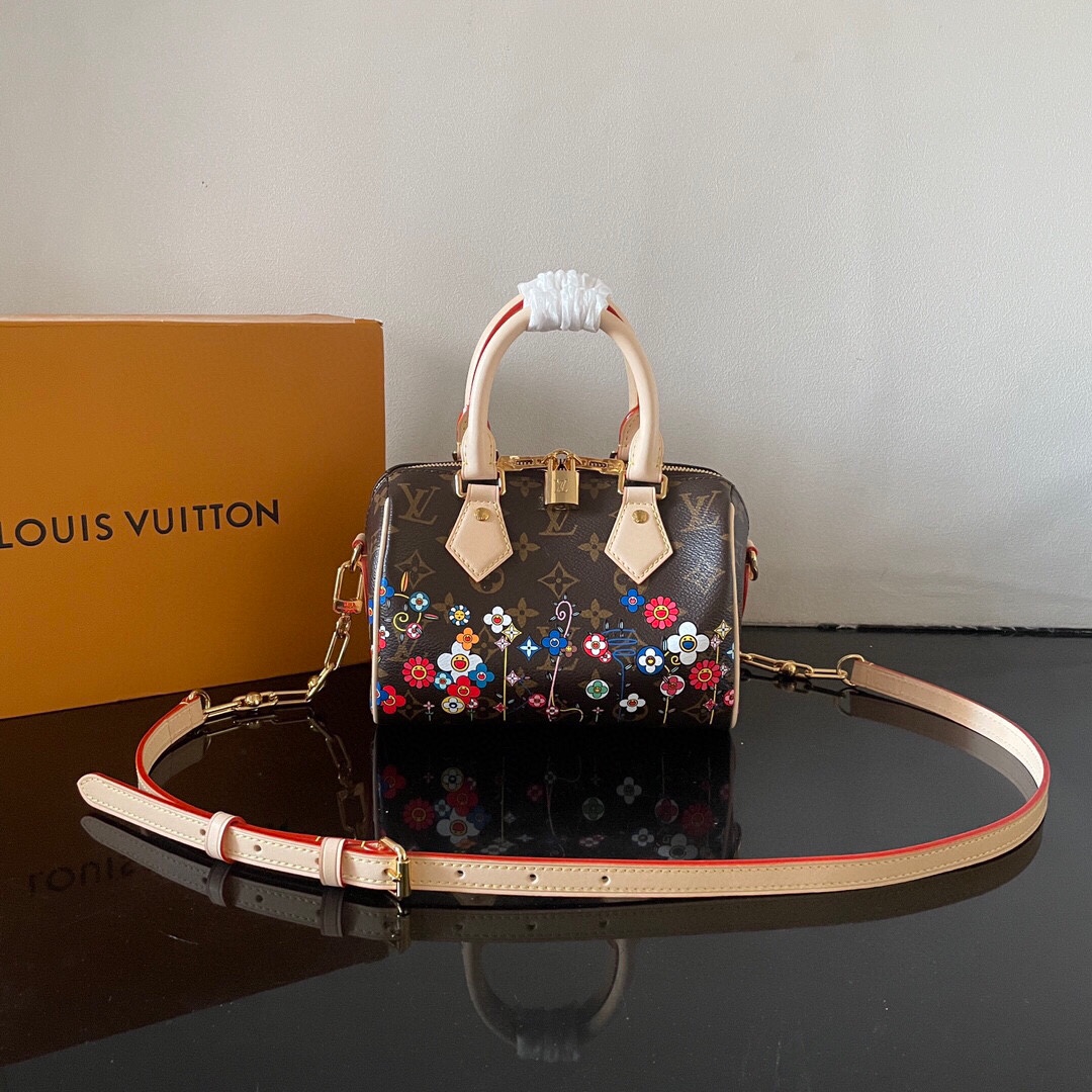 Louis Vuitton This Speedy Bandoulière 20 handbag combines Monogram canvas with cowhide leather trim.