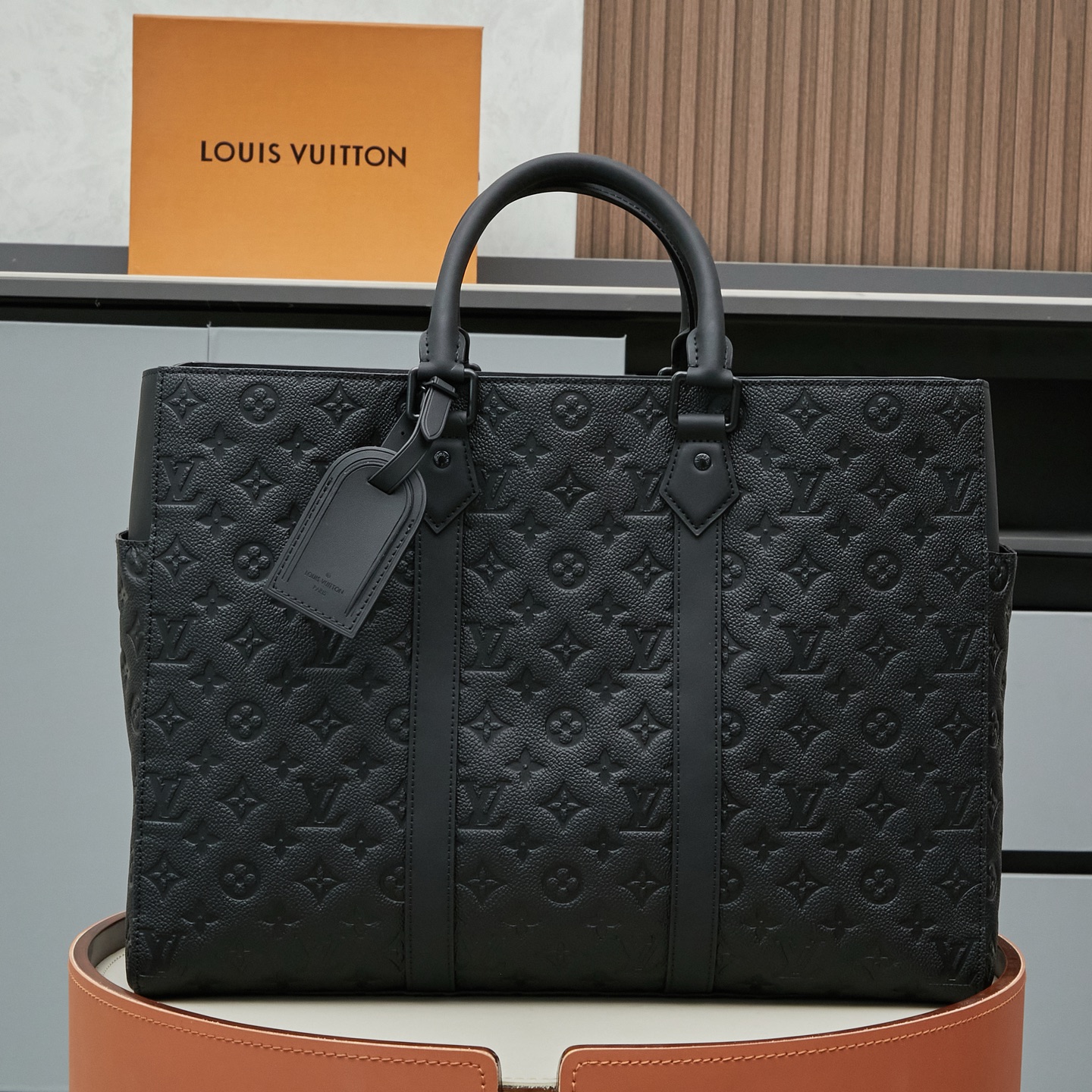 Louis Vuitton This Sac Plat 24H bag is crafted from Monogram-embossed Taurillon leather.