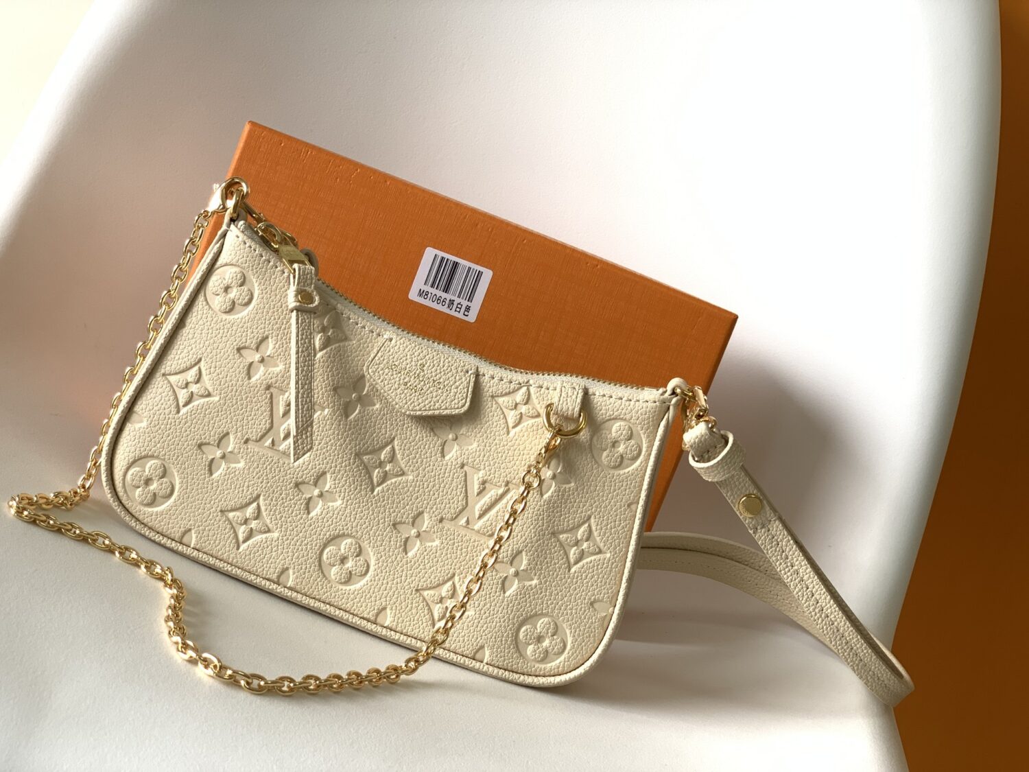 Louis Vuitton The Easy Pouch On Strap handbag from the Spring 2022 Collection is crafted from Monogram Empreinte leather.