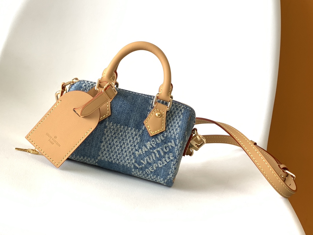 Louis Vuitton N40682 — FW New Denim Collection. The Sunset bag takes center stage in Monogram Denim canvas.