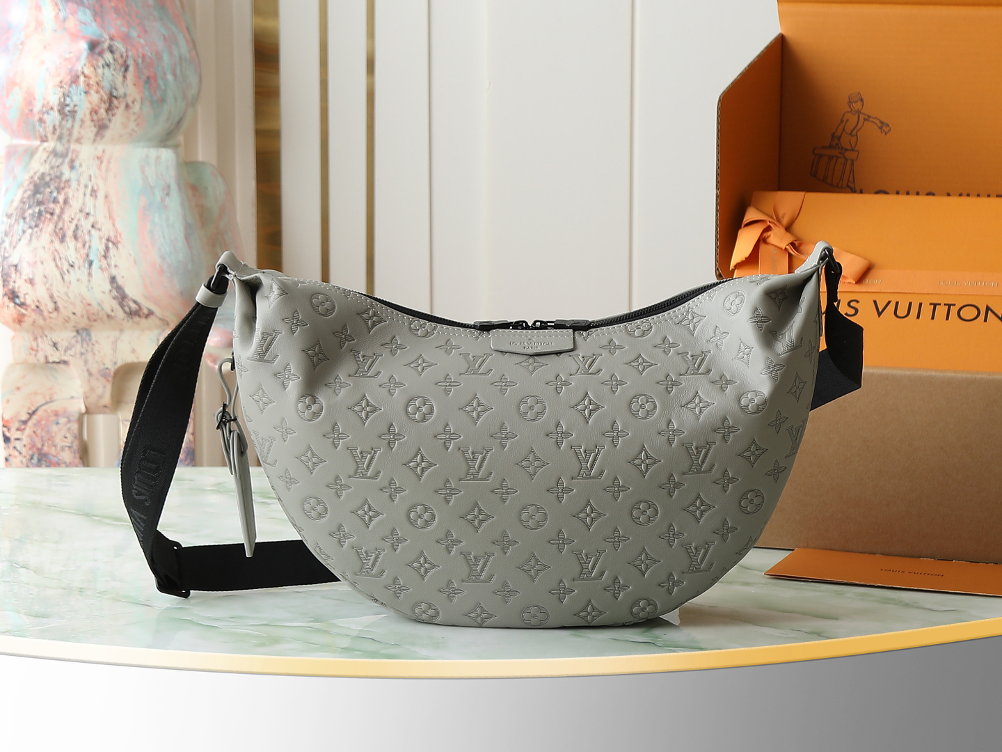 Louis Vuitton M24468: This Hobo Hamac bag is crafted from soft Monogram Shadow embossed cowhide leather.