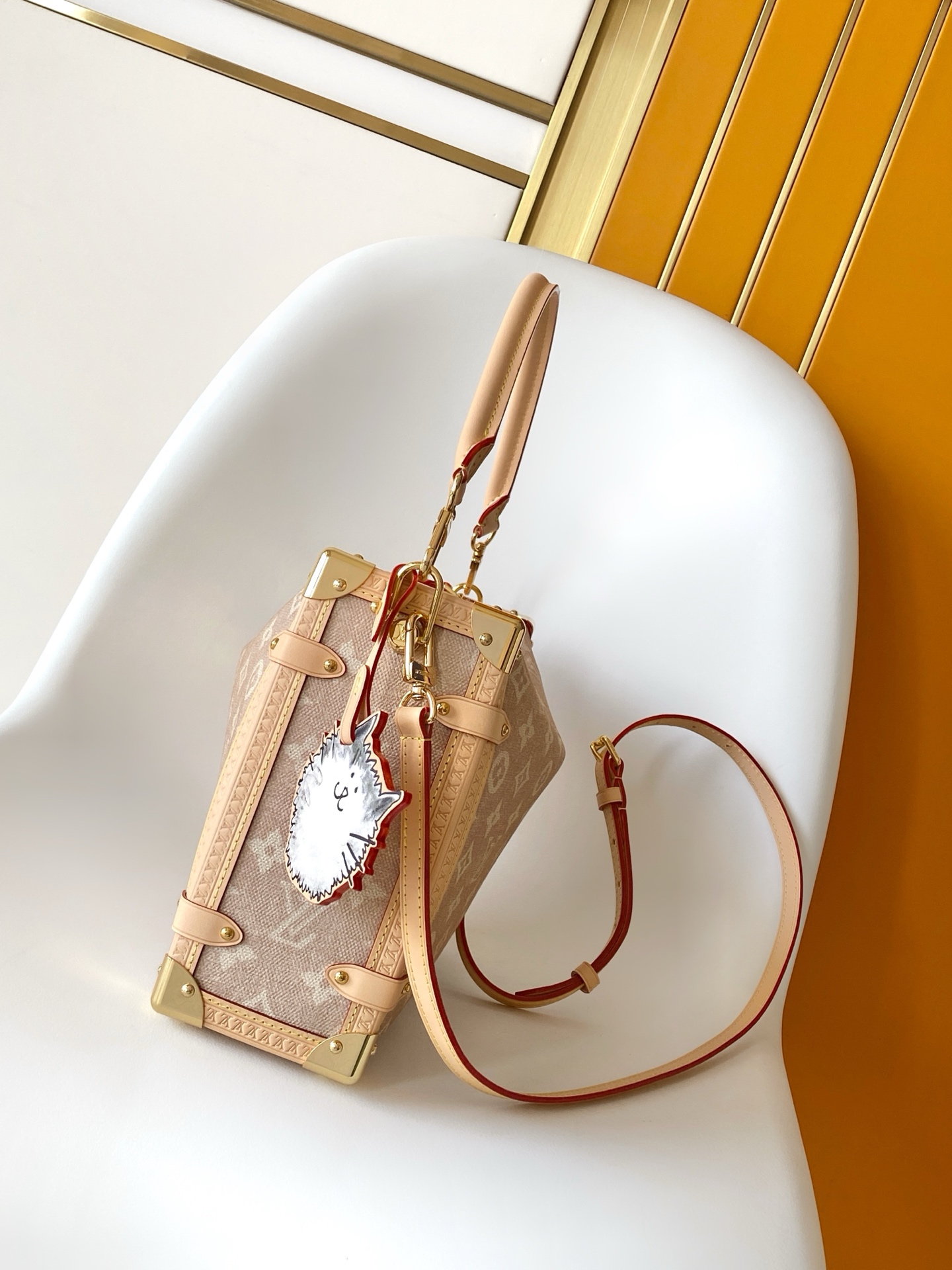 Louis Vuitton This "LV Travels With" edition of the large Side Trunk handbag showcases the brand's collaboration with a fashion icon and artist.