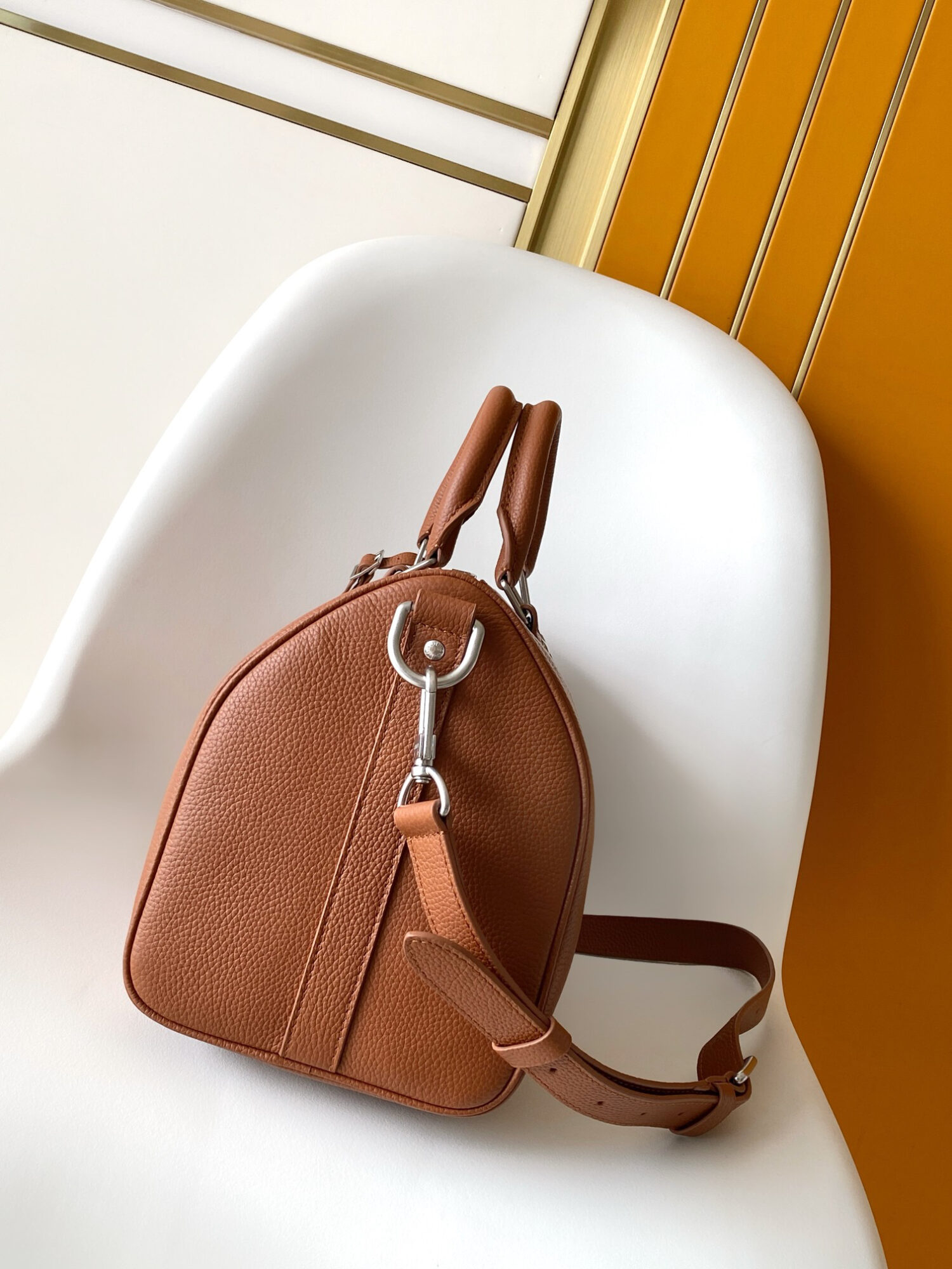 Louis Vuitton Keepall Bandoulière 35 Bag — This practical and versatile Keepall Bandoulière