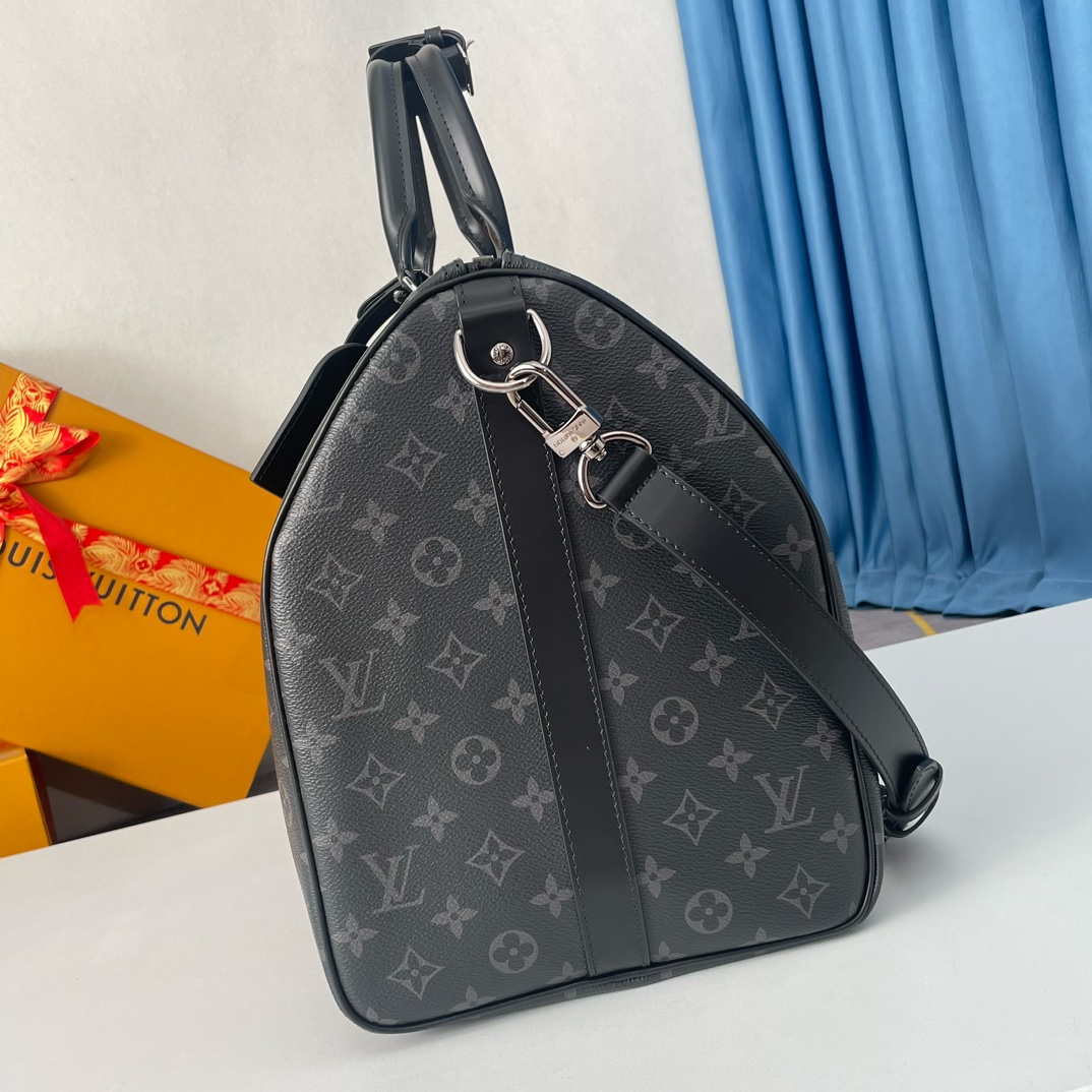 Louis Vuitton The Keepall 50 travel bag, crafted from the new, iconic black and grey Monogram Eclipse canvas.