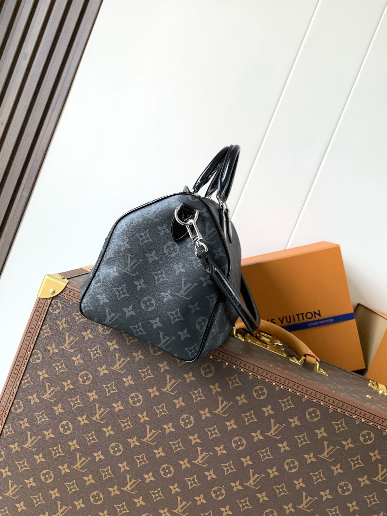 Louis Vuitton This Speedy Soft 30 handbag, part of the Ski Collection, reimagines the classic design in Monogram Eclipse canvas.
