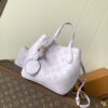 Louis Vuitton This small Blossom handbag is steeped in the modern hues of the new season.