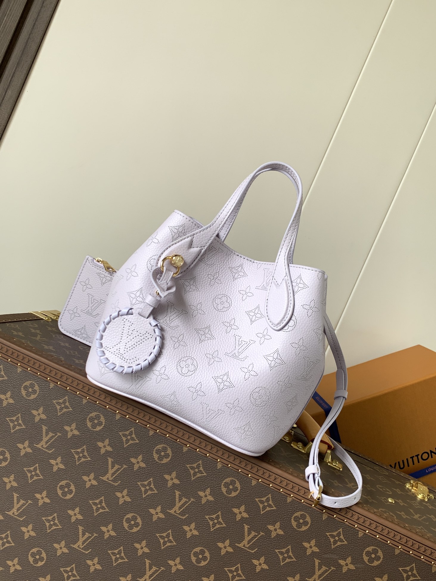Louis Vuitton This small Blossom handbag is steeped in the modern hues of the new season.