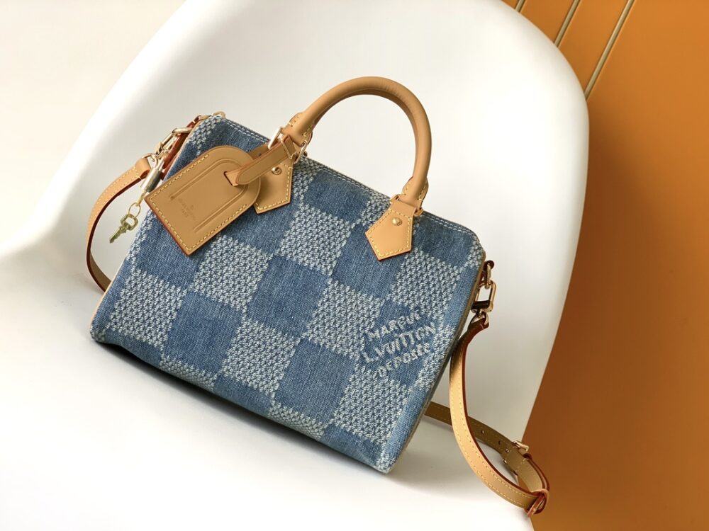 Louis Vuitton The new FW Denim Speedy 25 handbag—whether worn crossbody...
