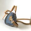Louis Vuitton N40682 — FW New Denim Collection. The Sunset bag takes center stage in Monogram Denim canvas.
