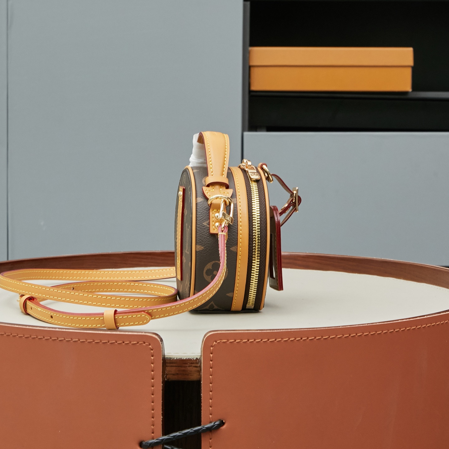 Louis Vuitton M44699 Monogram Canvas / M68276 Yellow Monogram: The Mini Boîte Chapeau handbag features a classic silhouette crafted from Monogram canvas.