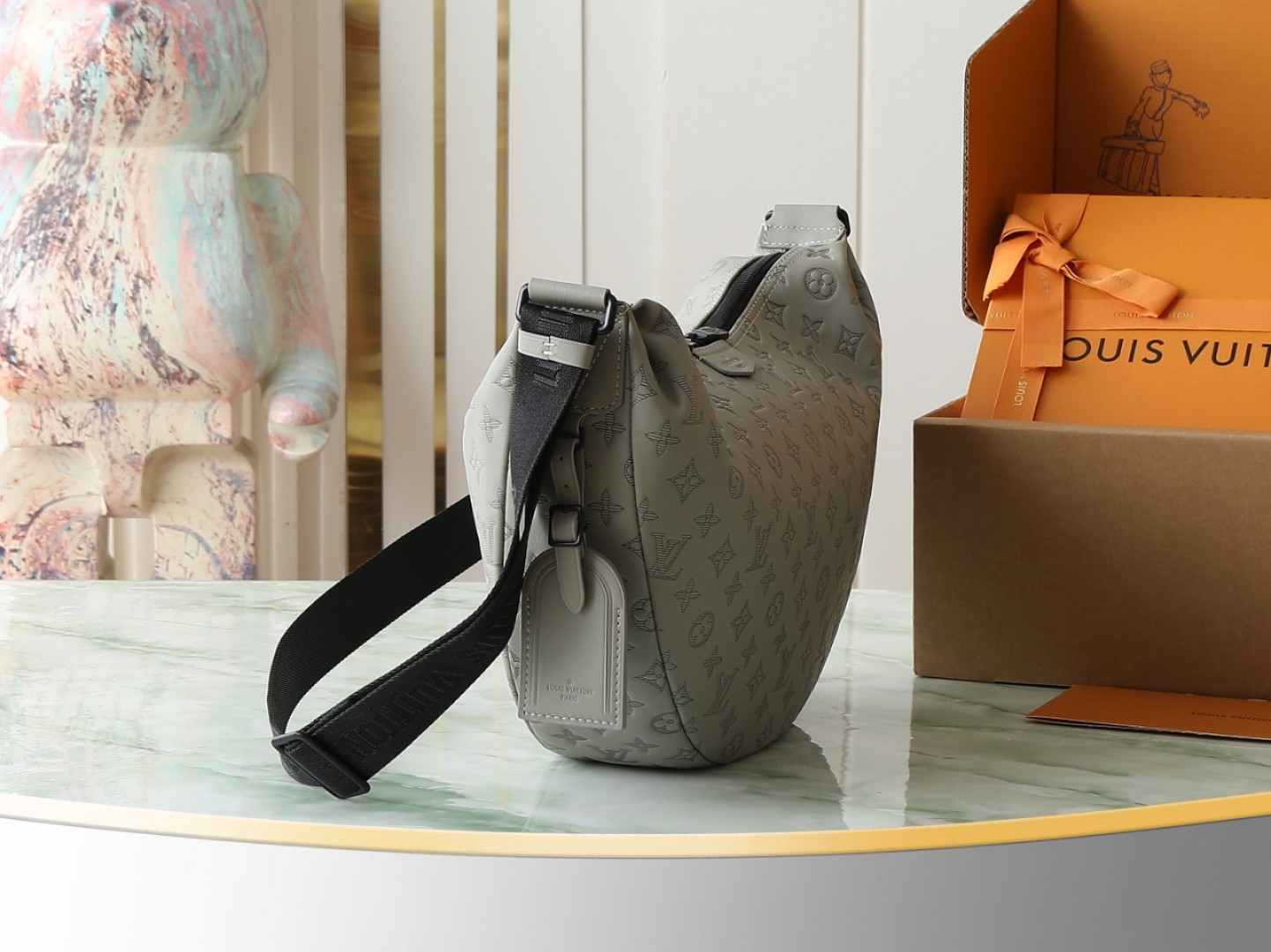 Louis Vuitton M24468: This Hobo Hamac bag is crafted from soft Monogram Shadow embossed cowhide leather.