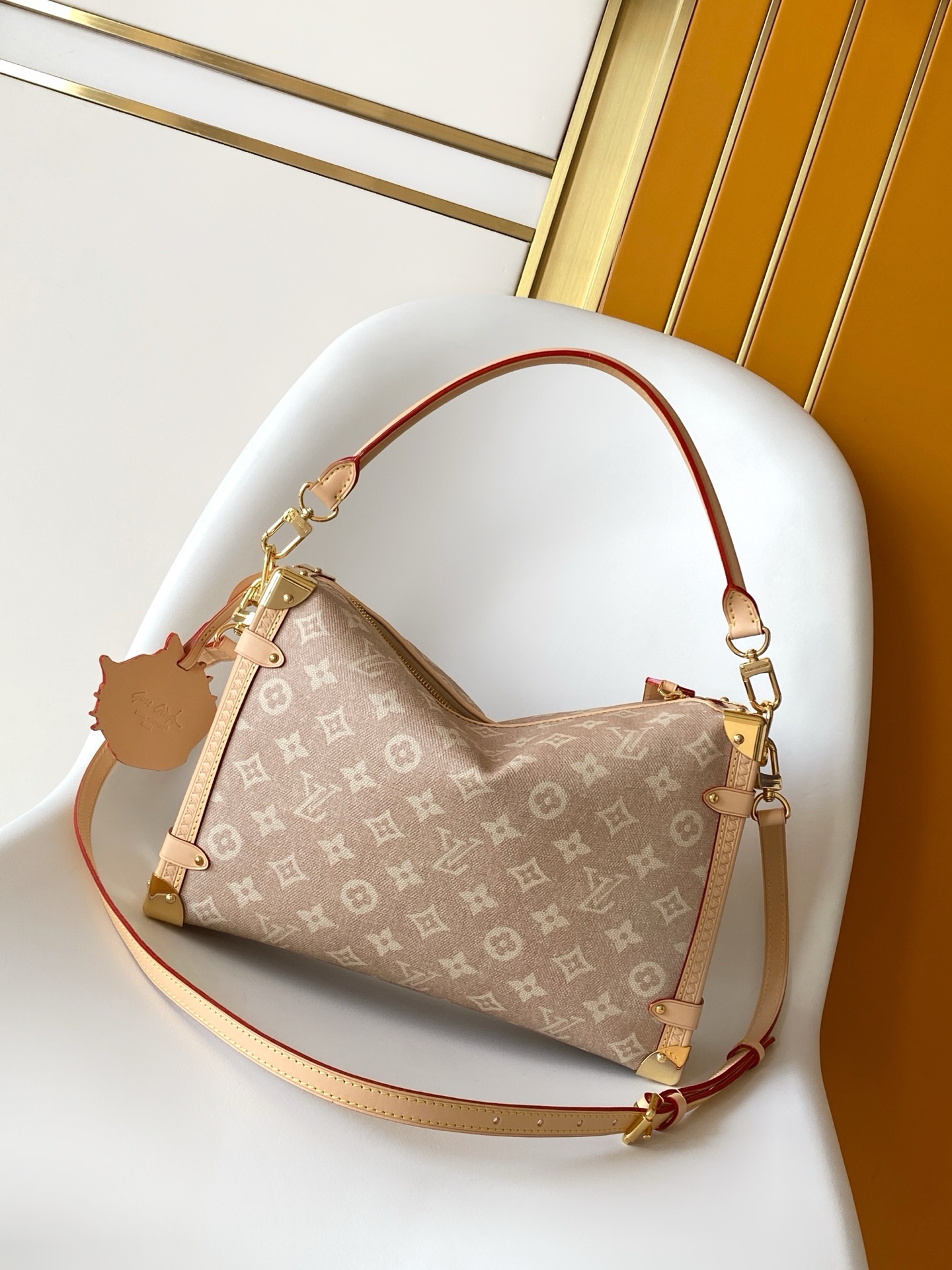 Louis Vuitton This "LV Travels With" edition of the large Side Trunk handbag showcases the brand's collaboration with a fashion icon and artist.