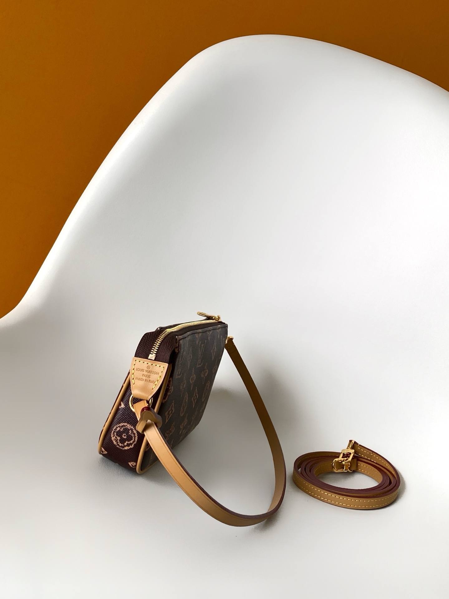 Louis Vuitton This Pochette Accessoires handbag is specially designed to celebrate the birth of the Louis Vuitton Monogram pattern.