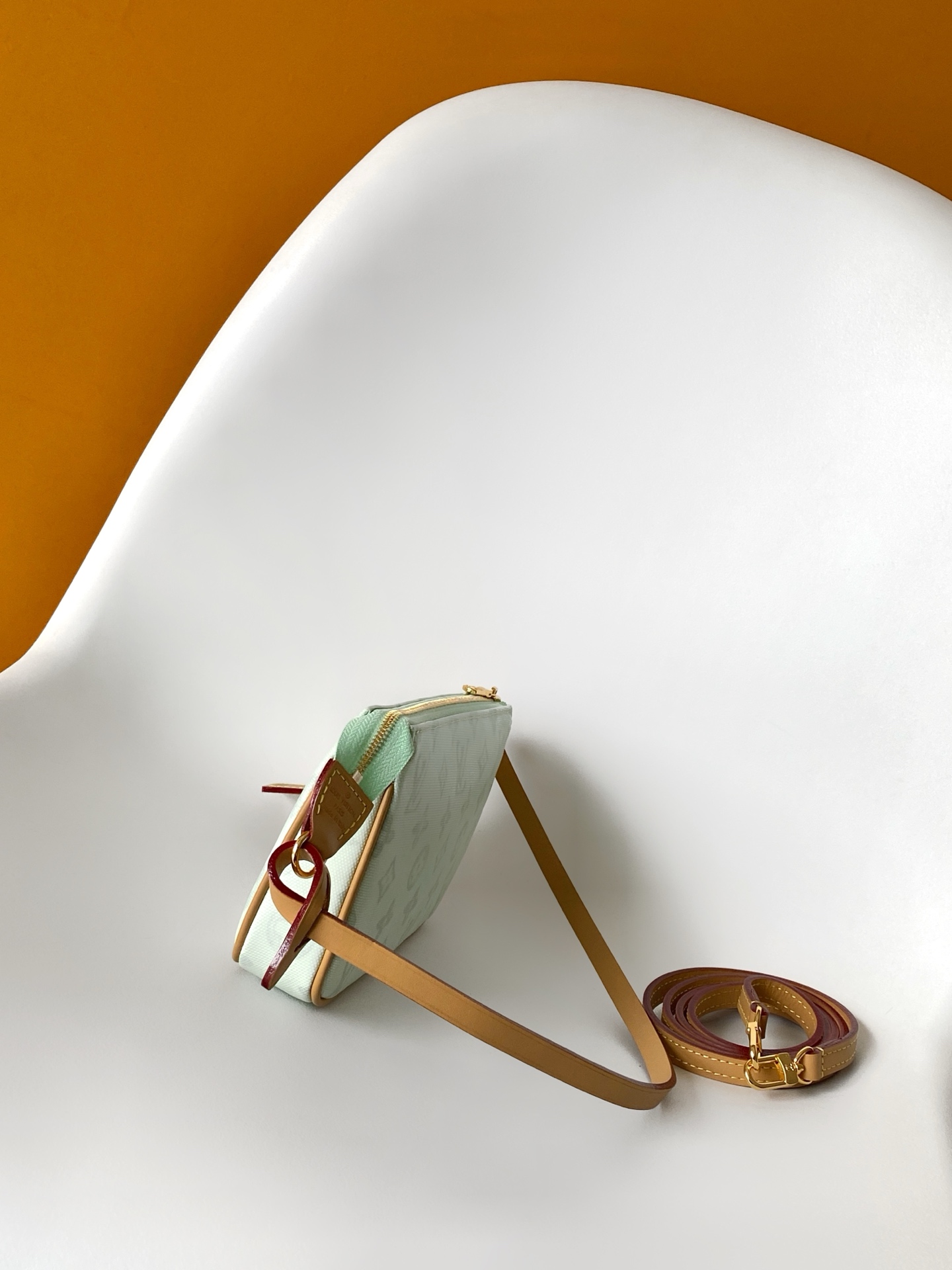 Louis Vuitton This Pochette Accessoires handbag is specially designed to celebrate the birth of the Louis Vuitton Monogram pattern.