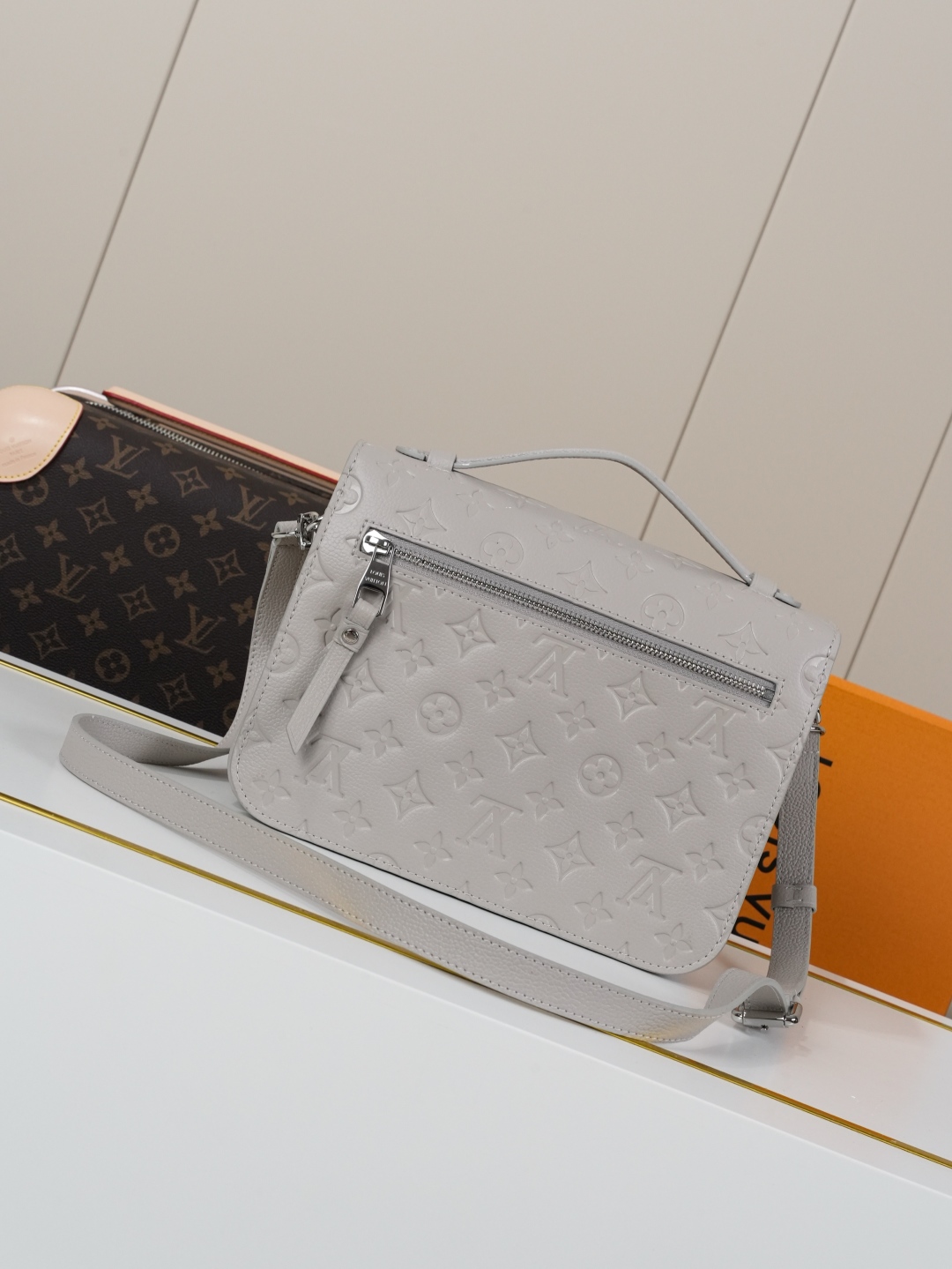 Louis Vuitton The Pochette Métis handbag interprets classic collegiate style through a design that is understated yet full of ingenious details.