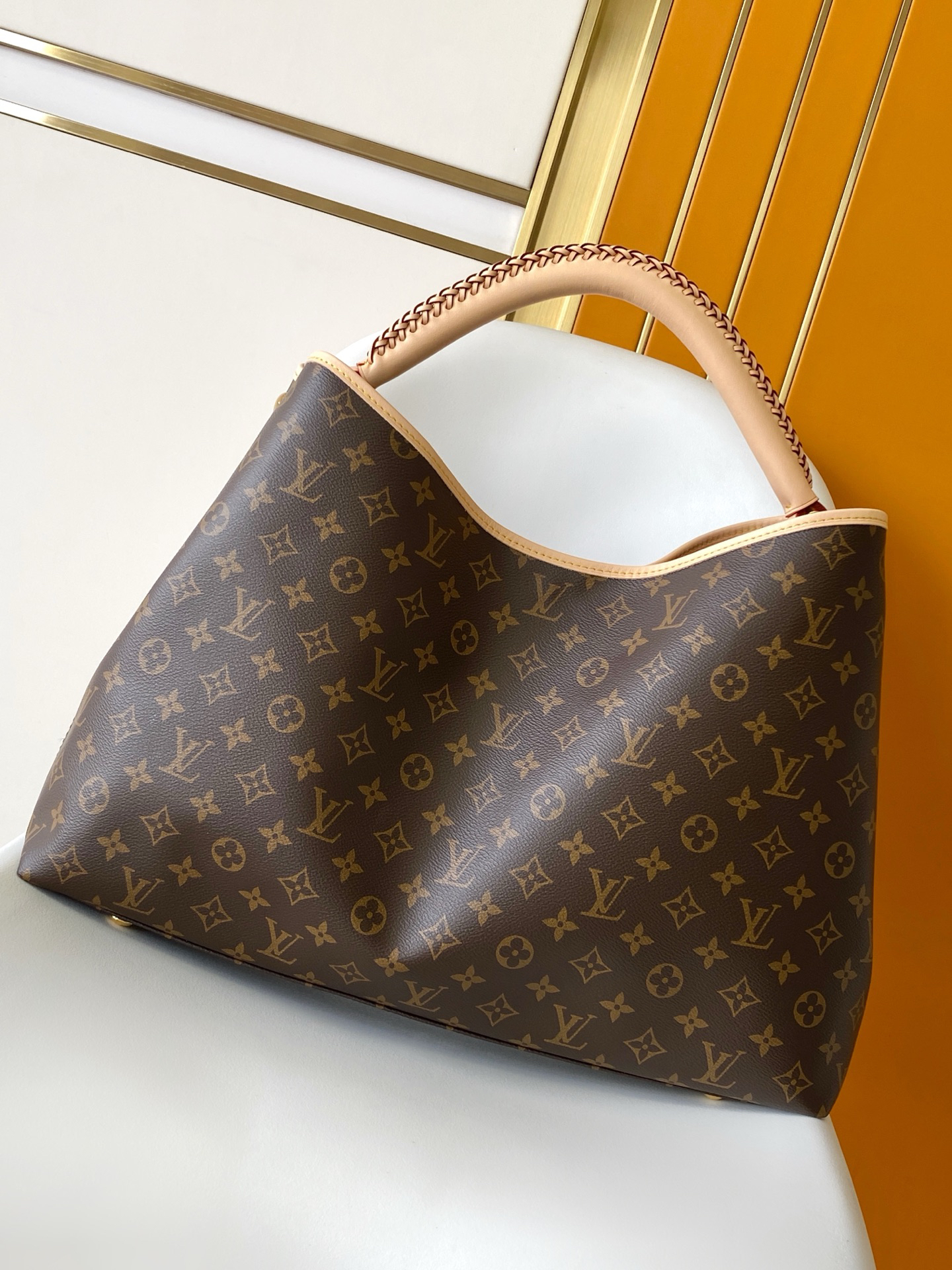 Louis Vuitton This Again bag is a contemporary, more supple, and iconic reinterpretation of the Artsy model, originally launched in 2010.