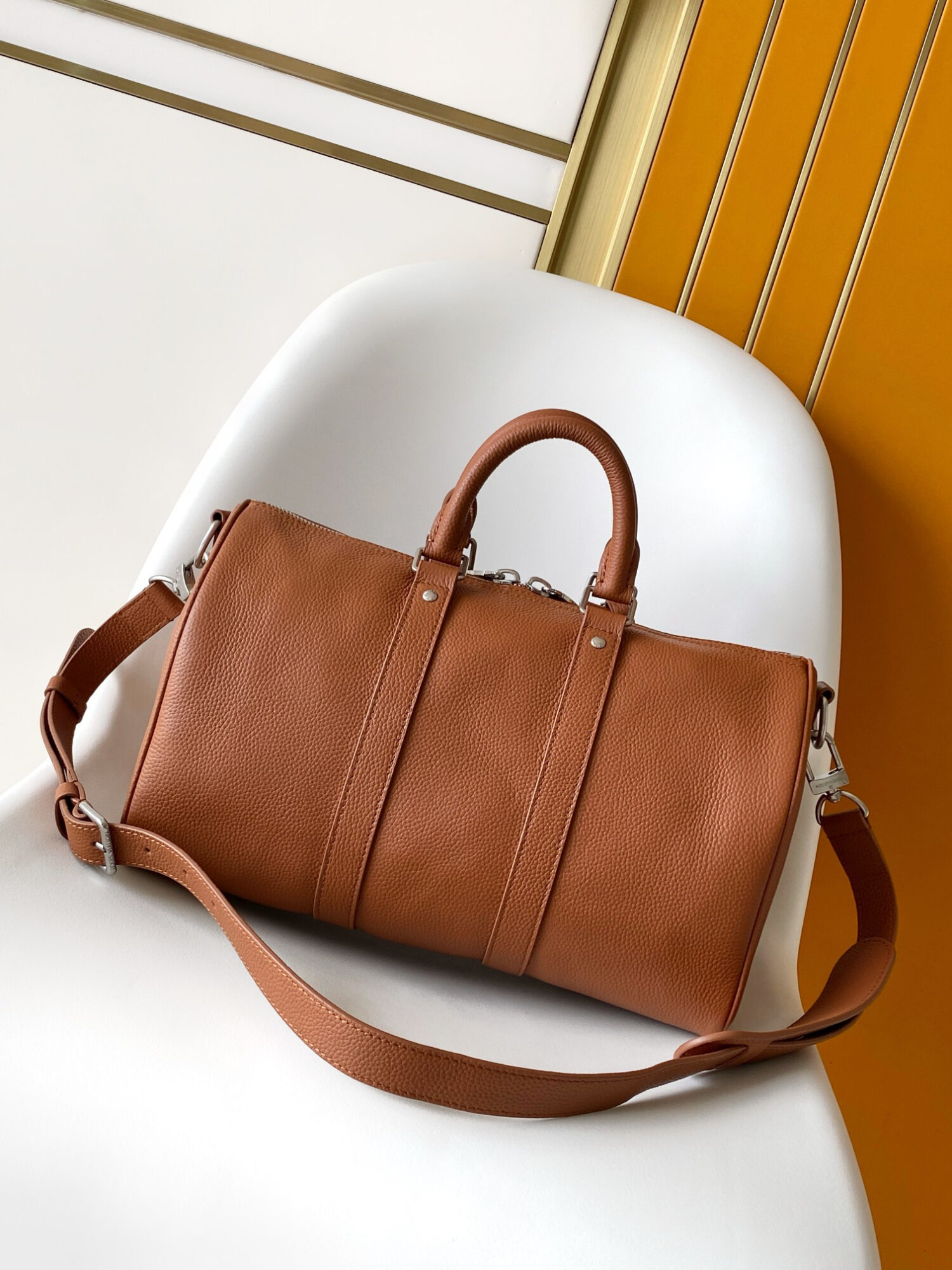 Louis Vuitton Keepall Bandoulière 35 Bag — This practical and versatile Keepall Bandoulière