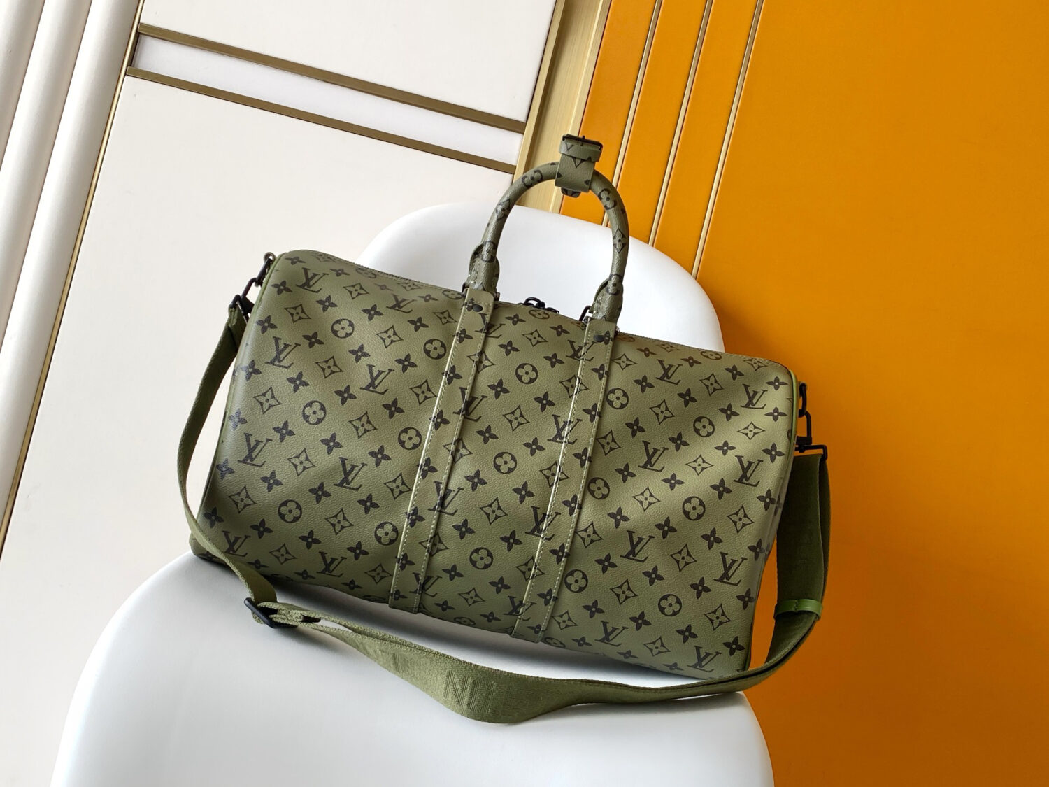Louis Vuitton This Keepall Bandoulière 45 travel bag is part of the Monogram Tones collection.