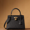 Hermes Kelly bag, black, 25cm, with gold hardware.