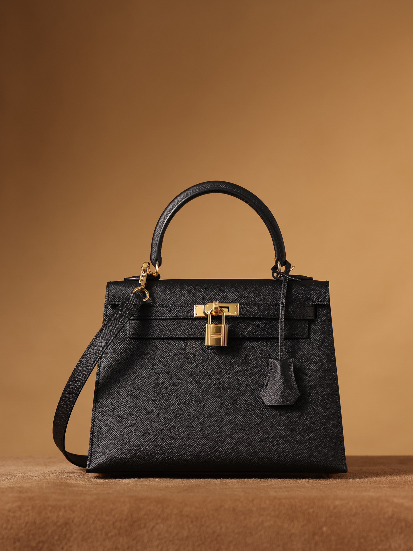 Hermes Kelly bag, black, 25cm, with gold hardware.