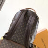 Louis Vuitton This Discovery Small Backpack features Monogram canvas accented with Monogram Reverse and Damier canvas patches.