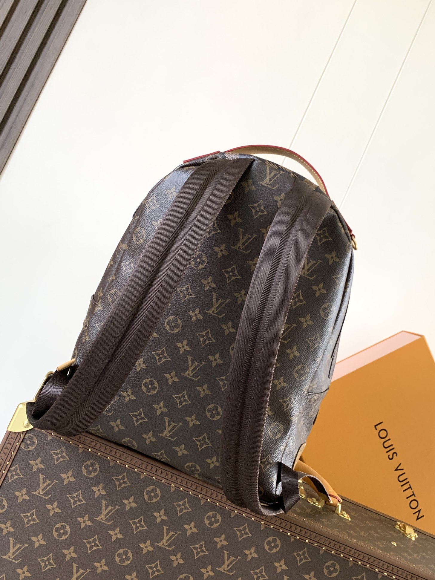 Louis Vuitton This Discovery Small Backpack features Monogram canvas accented with Monogram Reverse and Damier canvas patches.