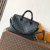 Louis Vuitton This Speedy Soft 30 handbag, part of the Ski Collection, reimagines the classic design in Monogram Eclipse canvas.