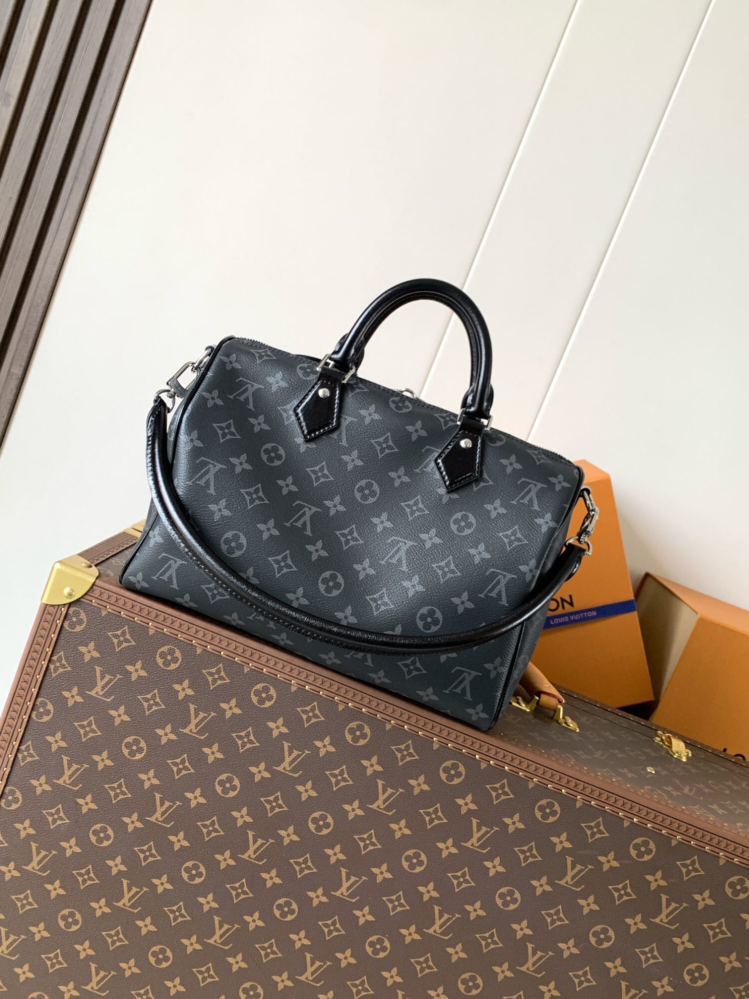 Louis Vuitton This Speedy Soft 30 handbag, part of the Ski Collection, reimagines the classic design in Monogram Eclipse canvas.