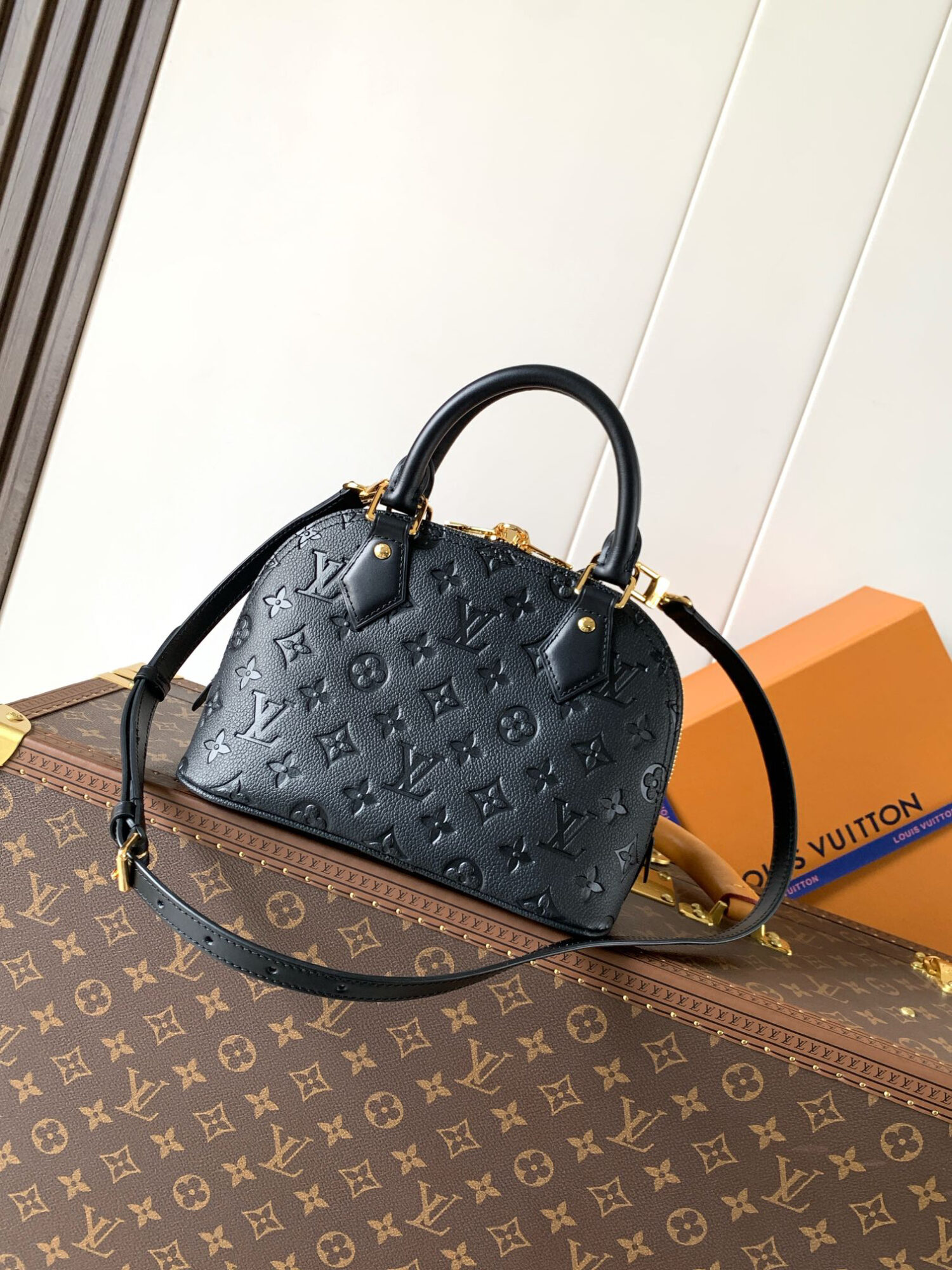 Louis Vuitton This Alma BB handbag showcases the iconic Alma BB silhouette, crafted from the House's exceptionally soft Monogram Empreinte leather.