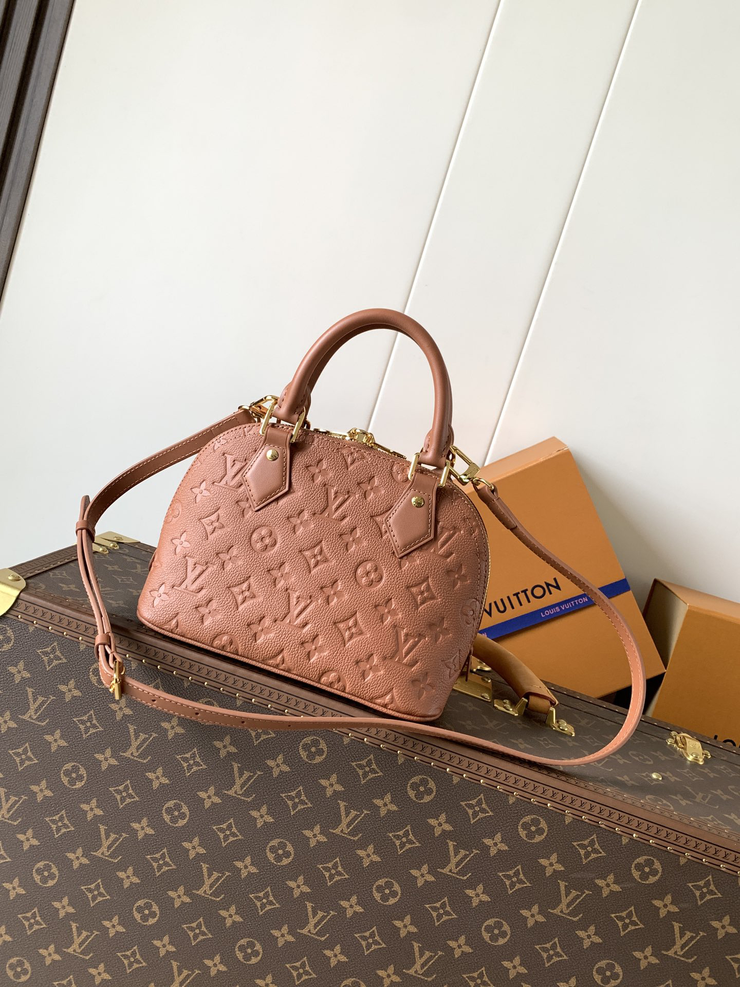 Louis Vuitton This Alma BB handbag showcases the iconic Alma BB silhouette, crafted from the House's exceptionally soft Monogram Empreinte leather.