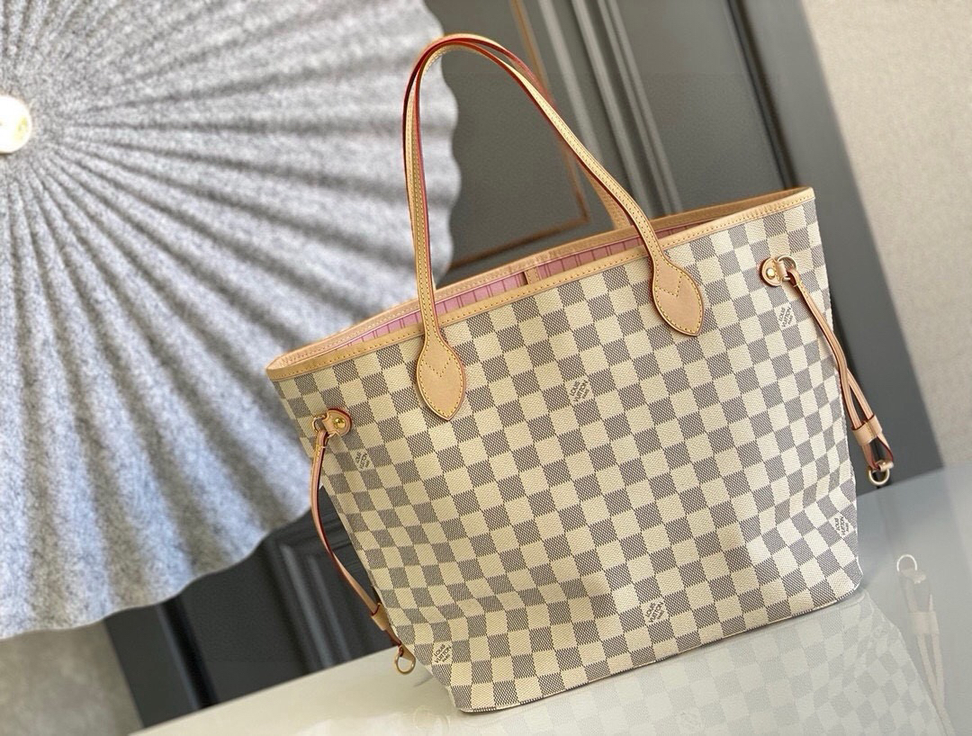 Louis Vuitton The legendary Neverfull handbag: always ready to meet your every need.