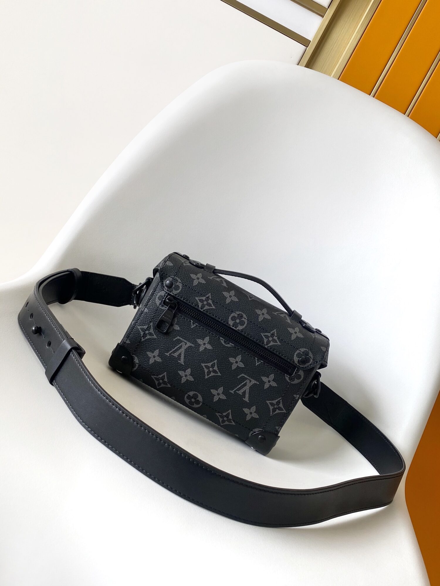 Louis Vuitton This Soul Trunk handbag is crafted from Monogram Eclipse canvas.