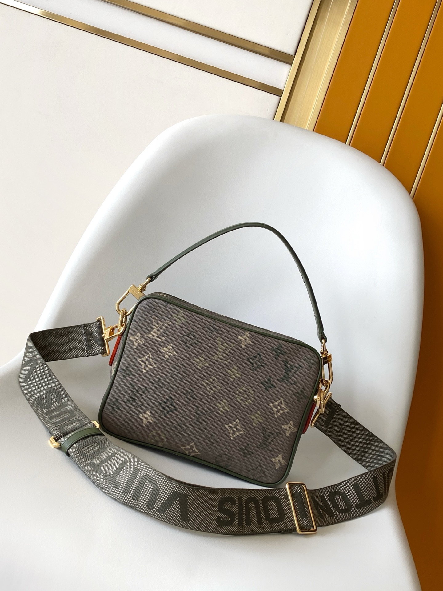 Louis Vuitton This Nil crossbody bag features a vintage silhouette crafted from Monogram Heritage canvas.