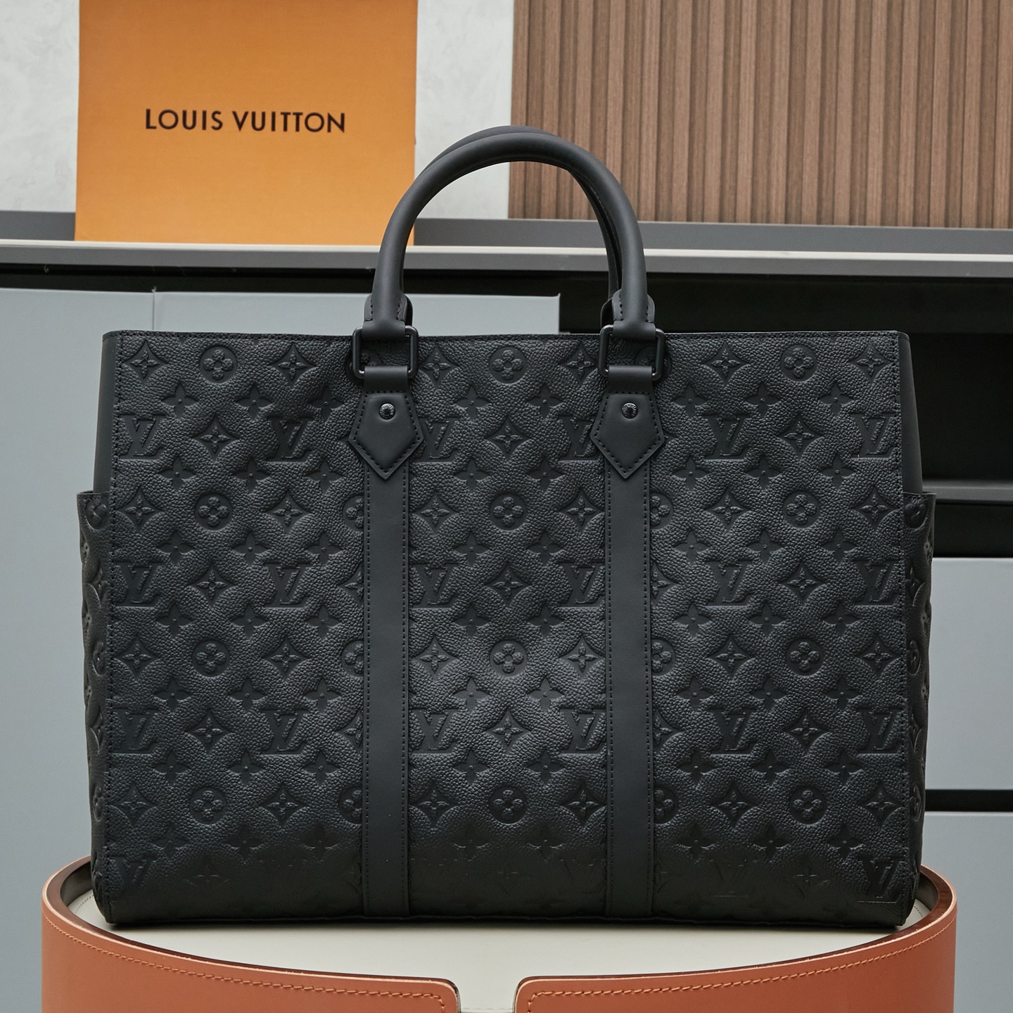 Louis Vuitton This Sac Plat 24H bag is crafted from Monogram-embossed Taurillon leather.