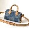 Louis Vuitton N40682 — FW New Denim Collection. The Sunset bag takes center stage in Monogram Denim canvas.