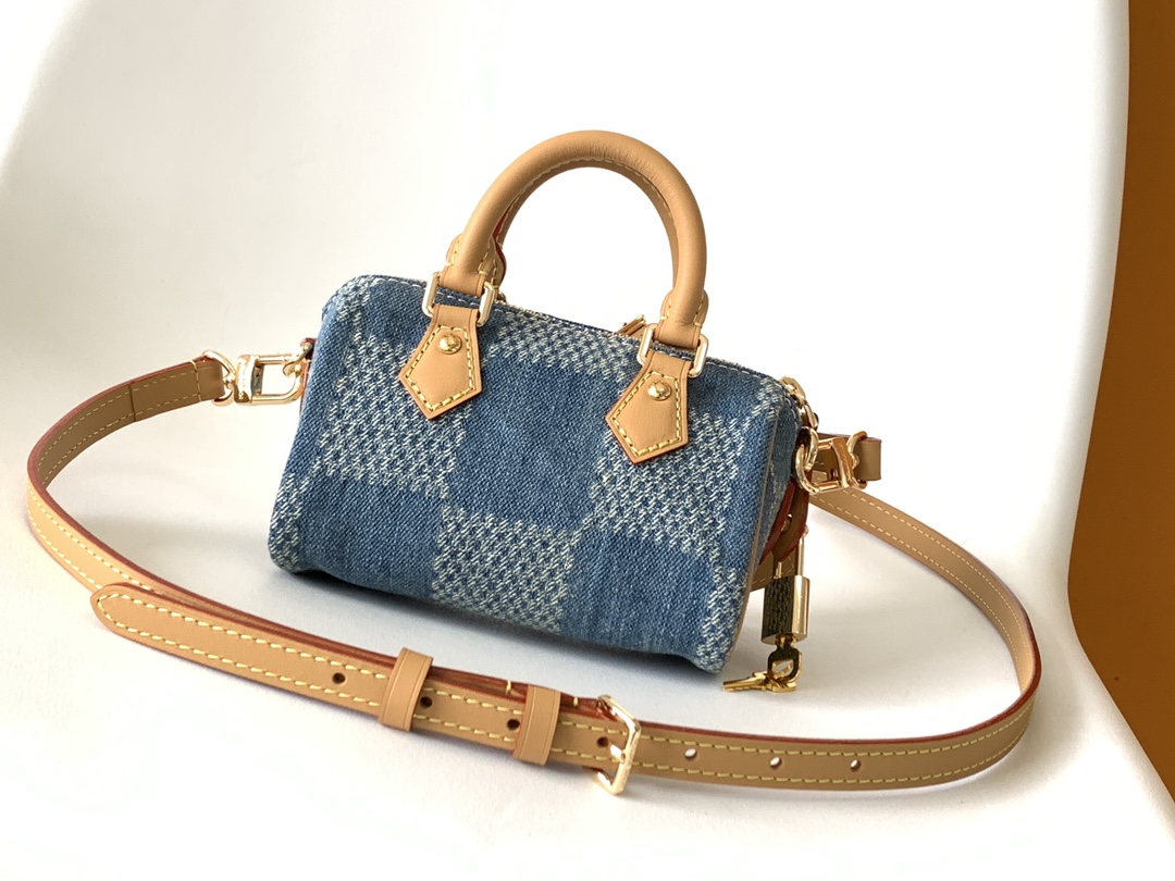 Louis Vuitton N40682 — FW New Denim Collection. The Sunset bag takes center stage in Monogram Denim canvas.