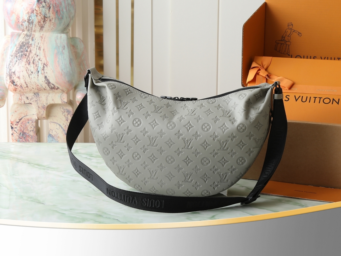 Louis Vuitton M24468: This Hobo Hamac bag is crafted from soft Monogram Shadow embossed cowhide leather.
