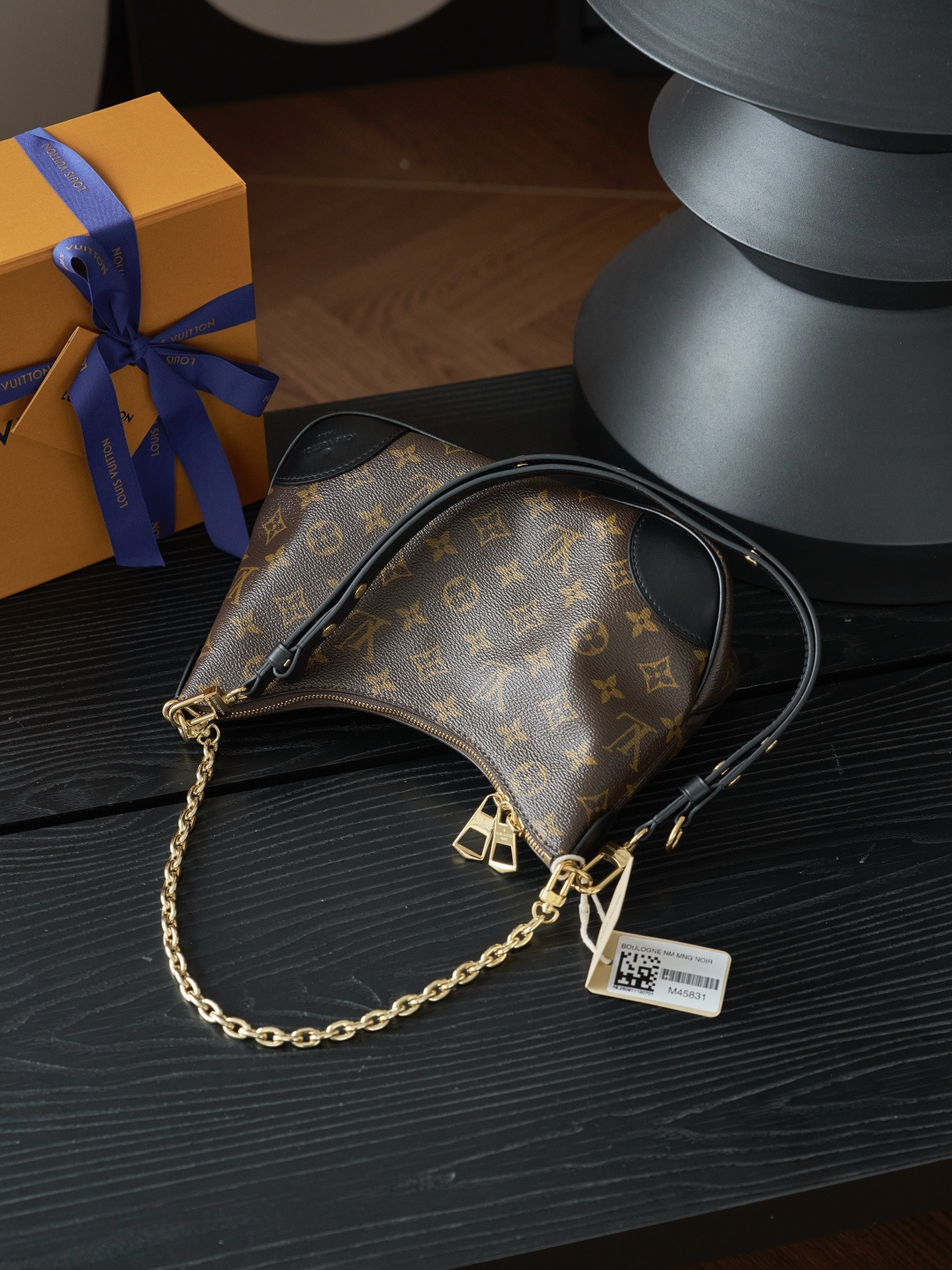 Louis Vuitton Crafted from classic Monogram canvas, this small Boulogne handbag features a double-zip closure and a spacious interior flat pocket large enough to accommodate a smartphone.