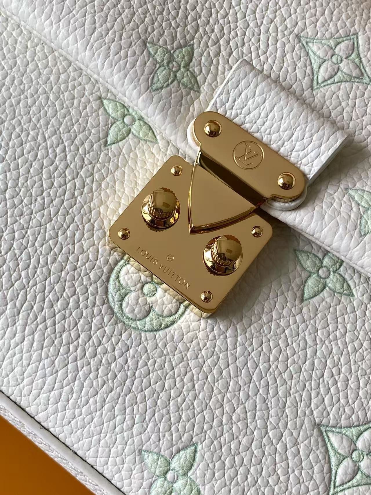 Louis Vuitton This Nano Madeleine handbag reimagines the Madeleine in Monogram Empreinte leather.