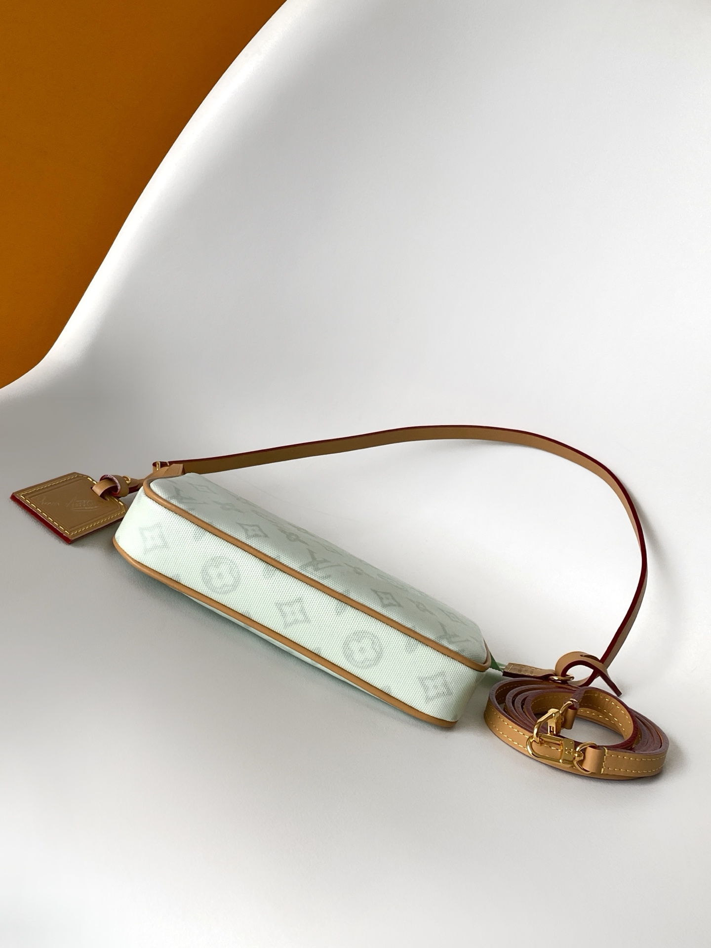 Louis Vuitton This Pochette Accessoires handbag is specially designed to celebrate the birth of the Louis Vuitton Monogram pattern.