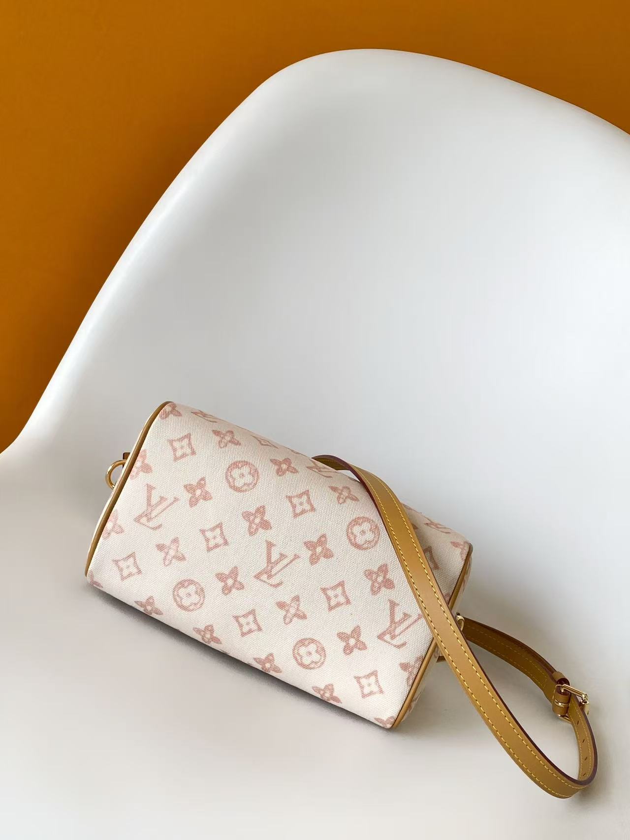 Louis VuittonThis Speedy Bandoulière 20 handbag encapsulates the design of the brand's traditional Speedy travel bag.