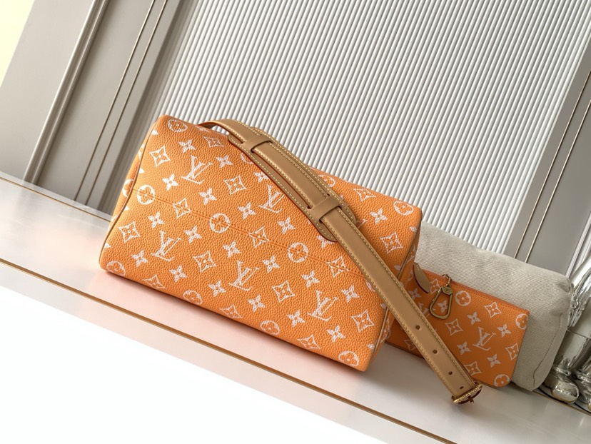 Louis Vuitton M14064 Orange: This Sedy Bandoulière 30 handbag features a design rendered upon a surface of refined cowhide leather.