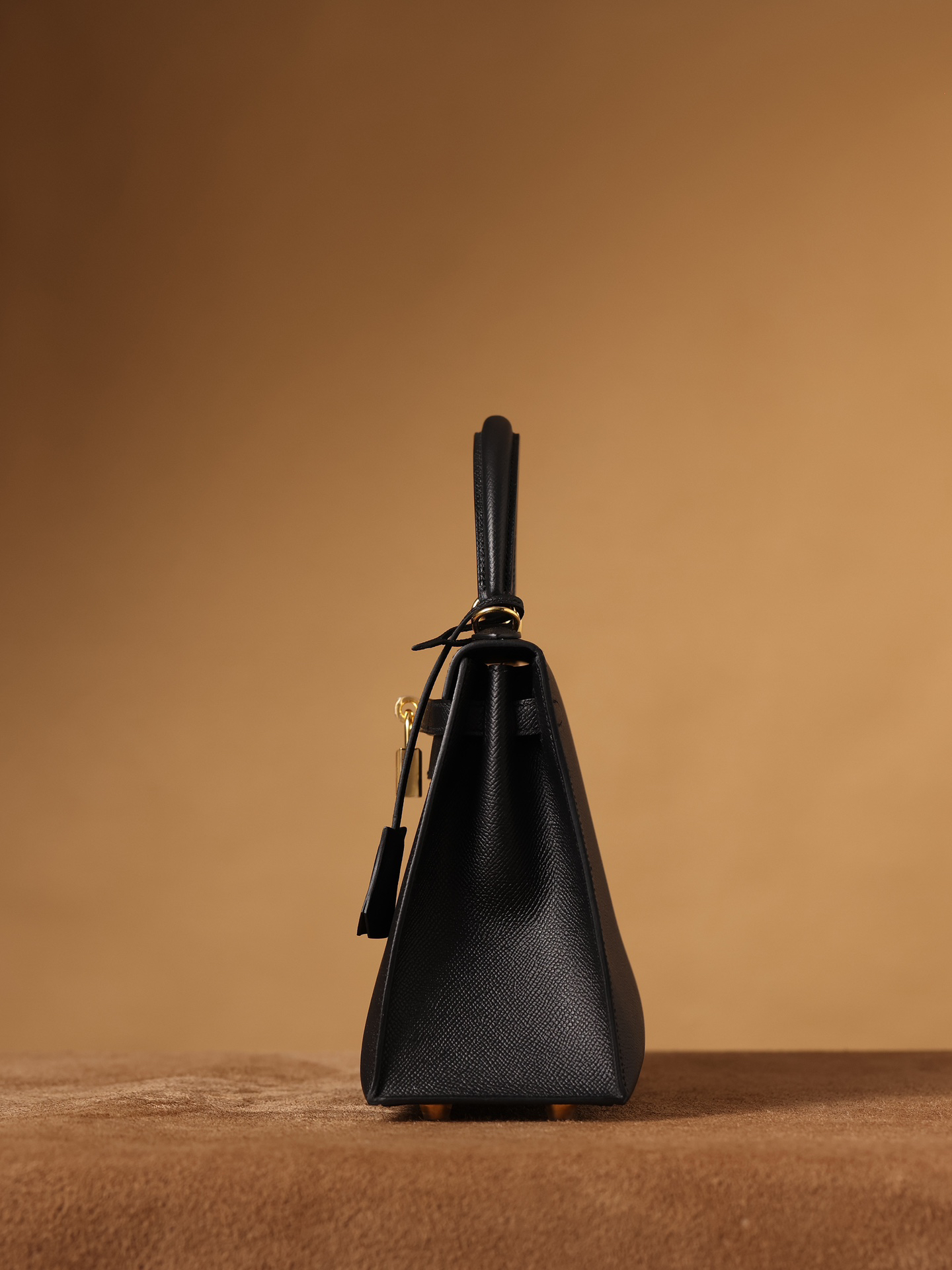 Hermes Kelly bag, black, 25cm, with gold hardware.