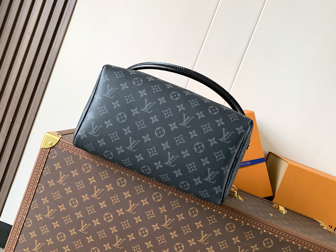 Louis Vuitton This Speedy Soft 30 handbag, part of the Ski Collection, reimagines the classic design in Monogram Eclipse canvas.