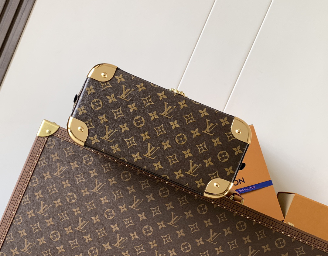 Louis Vuitton The Trunk collection welcomes a contemporary new iteration of the Alma Small handbag, paying homage to the brand's travel heritage with exquisite metal hardware.