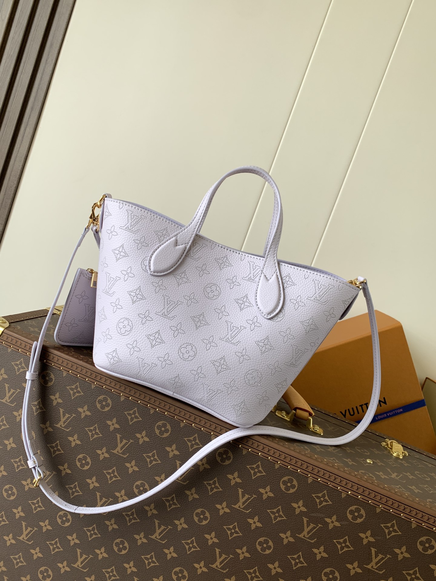 Louis Vuitton This small Blossom handbag is steeped in the modern hues of the new season.