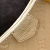Louis Vuitton The Easy Pouch On Strap handbag from the Spring 2022 Collection is crafted from Monogram Empreinte leather.