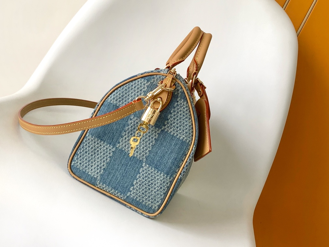 Louis Vuitton The new FW Denim Speedy 25 handbag—whether worn crossbody...